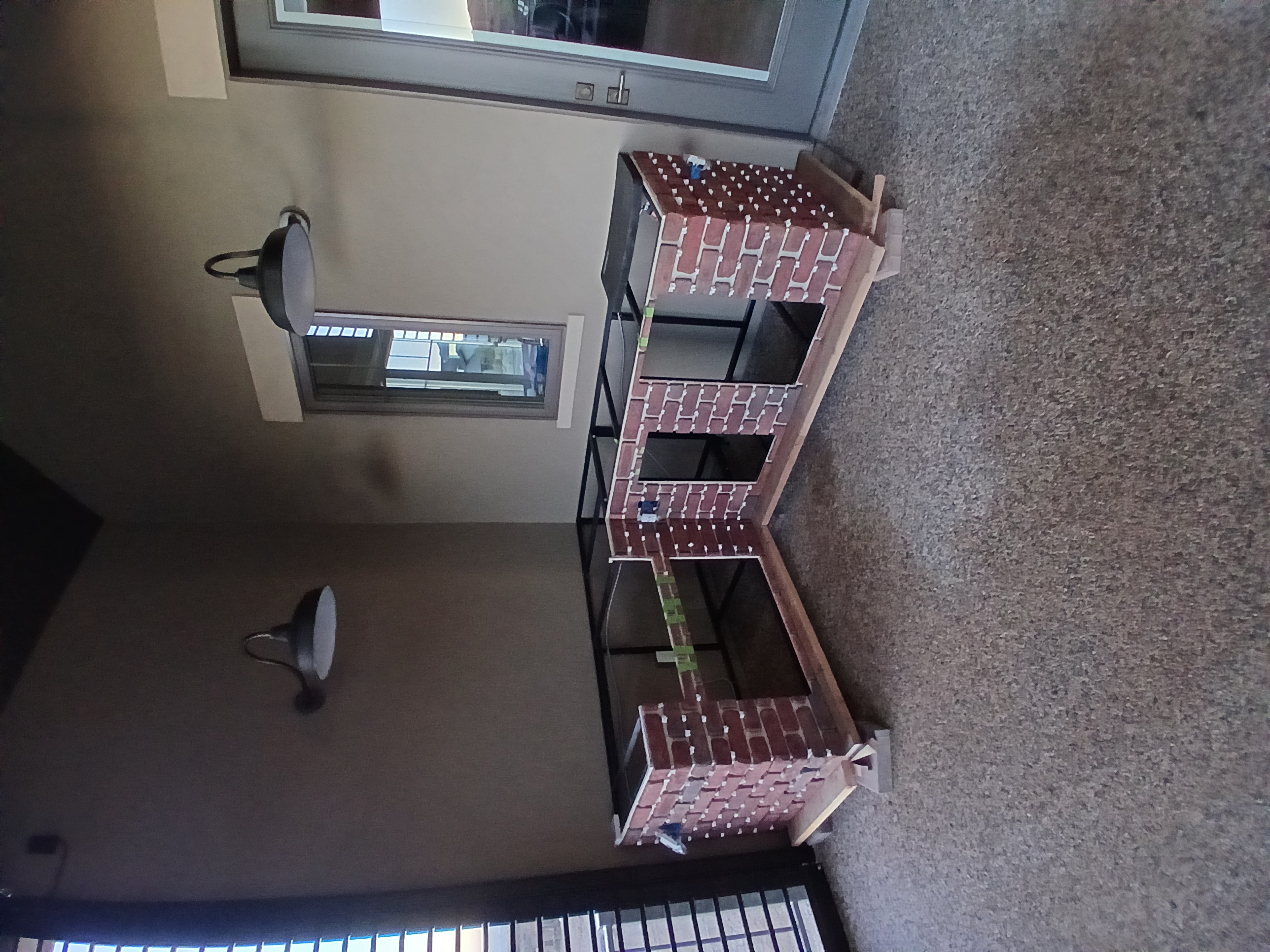 Steel frame outdoor kitchen with brick finish