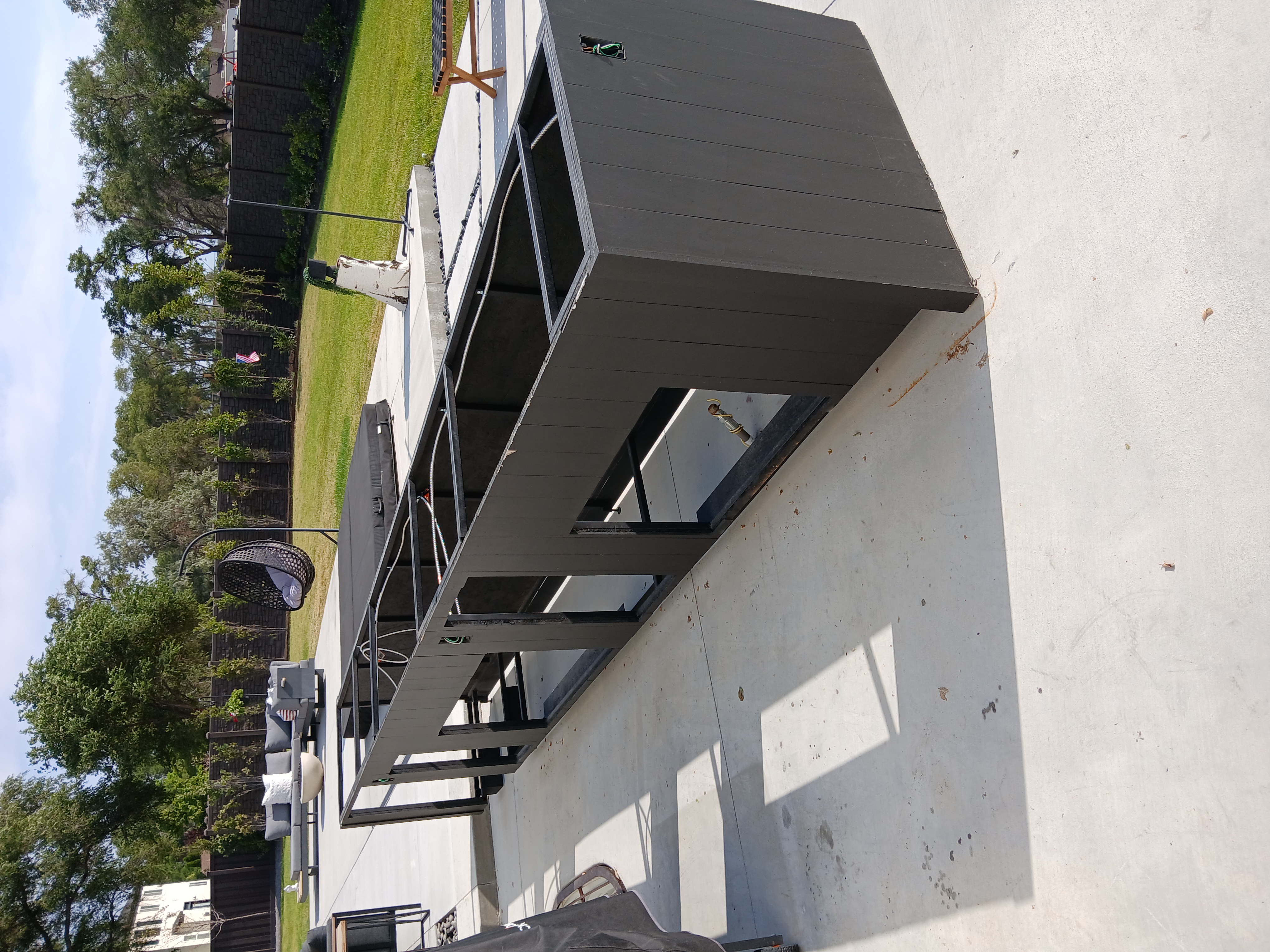 Steel frame outdoor kitchen with Hardie board cladding